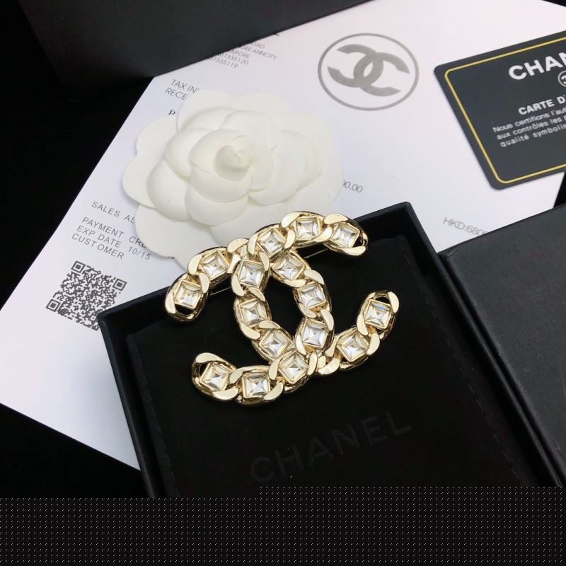 Ch*el brooches
